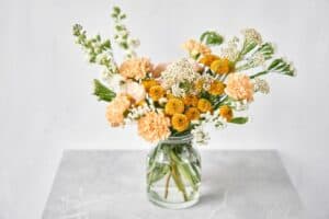 Bouquet if orange flowers in vase