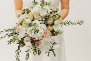 Bride holding floral bouquet