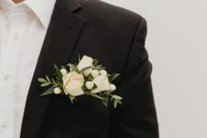Groom wearing floral boutonniere