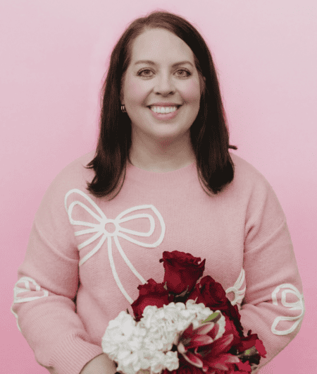 Pretty woman holding flowers
