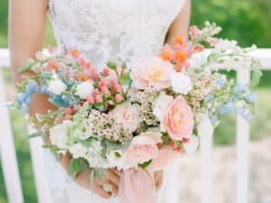 Bride holding spring bouquet